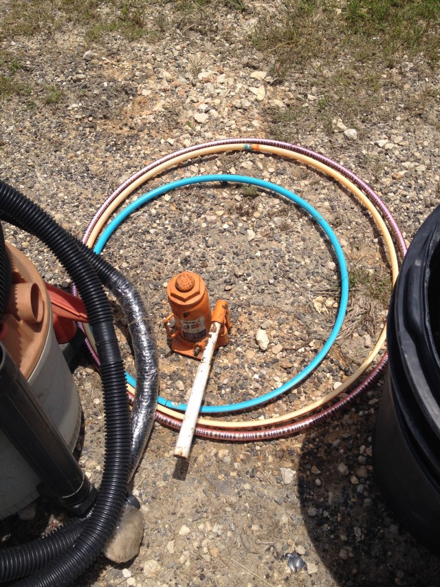 2014-05-17-Cleaning-under-Justins-porch-09-hula-hoops.JPG