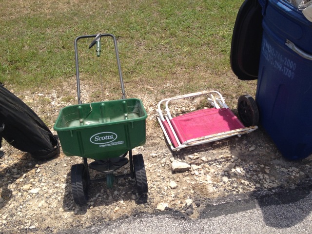 2014-05-17-Cleaning-under-Justins-porch-11-fertilzer-spreader.JPG