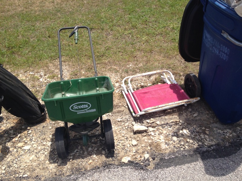 2014-05-17-Cleaning-under-Justins-porch-11-fertilzer-spreader.JPG