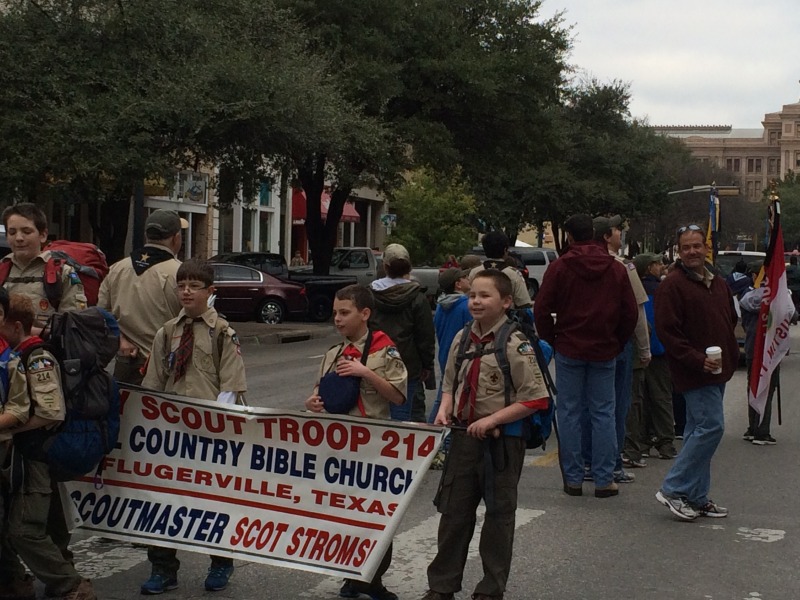 2015/02(February)/Troop214-Report-to-State/800x600_2015-02-07-Troop214-Report-to-State-Parade-17-Caise-ConnorH-Aiden-Zach.JPG