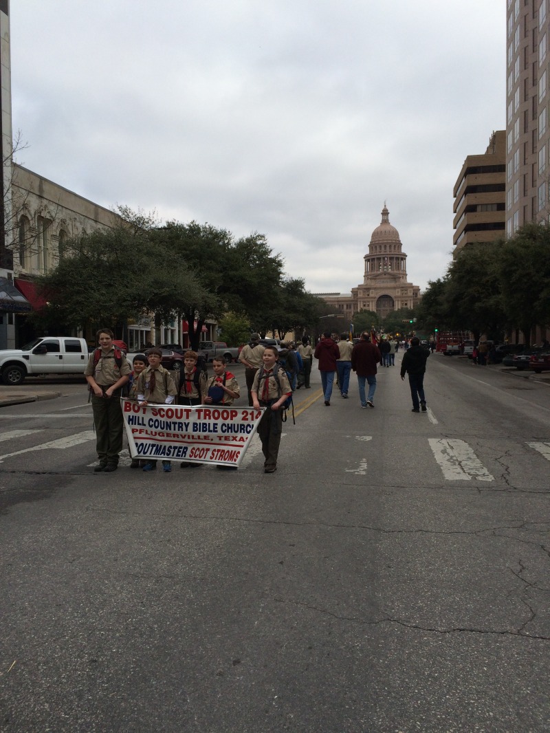2015/02(February)/Troop214-Report-to-State/800x600_2015-02-07-Troop214-Report-to-State-Parade-19-Case-ConnorH-ConnorM-Aiden-Zach.JPG