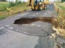 2015-05-26-Memorial-Day-Flood-07-road-damage.JPG