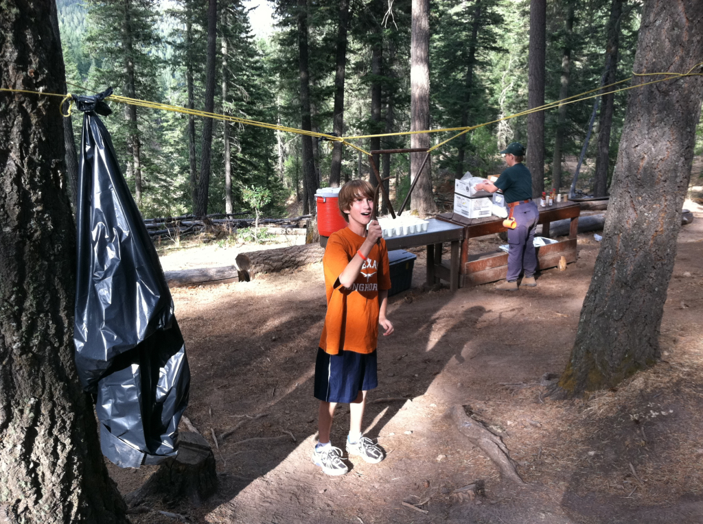 2011-06-30-Troop214-Camp-Wehinahpay-32-Chance-ringing-dinner-bell.jpg