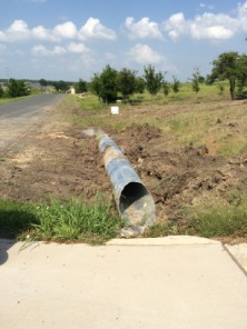2015-05-20-Neighbor-drainage-pipe-3.JPG