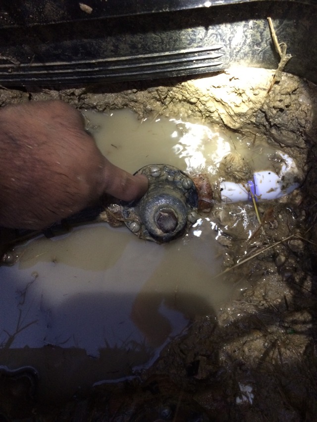 2015-06-09-Water-Leak-at-street-on-Manvilles-side-2.JPG