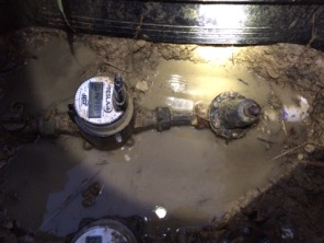 2015-06-09-Water-Leak-at-street-on-Manvilles-side-5.JPG