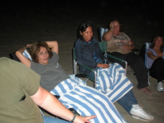 2009-09-16-ITOC-R1-Huntington-Beach-training-30-campfire-Lydia-Lorie-Maryan-Barbie.JPG