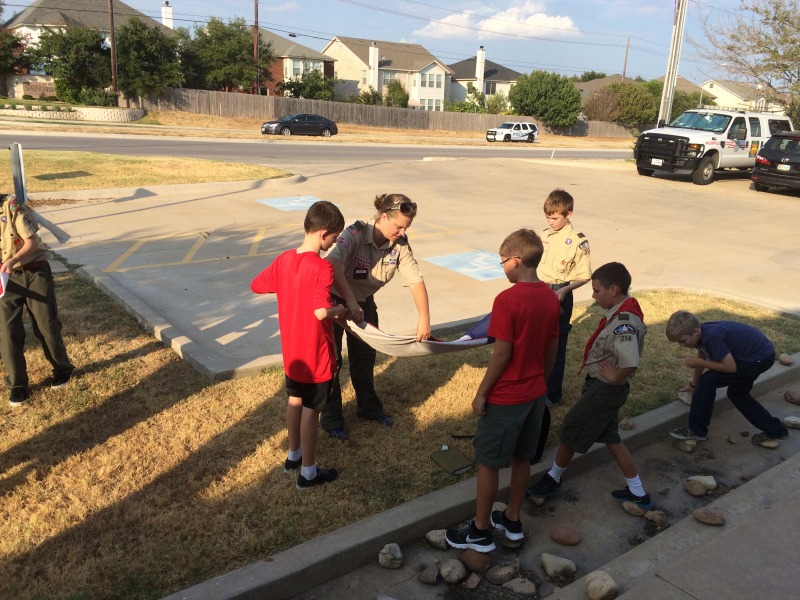 2015/08(August)/Troop214-FireStation-and-Lockin/2015-08-17-Troop214-Pflugerville-Fire-Station-1-folding-retired-flags-Davis-Shea-Jonathan-PatrickB-Aiden.JPG