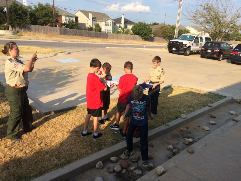2015/08(August)/Troop214-FireStation-and-Lockin/800x600_2015-08-17-Troop214-Pflugerville-Fire-Station-3-folding-retired-flags-Shea-Davis-Aiden-Jonathan-Patrick.JPG
