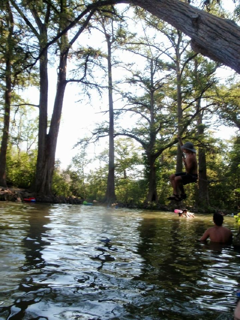 2015-08-01-Troop214-Krause-Springs-10-Travis-swinging-on-rope.JPG