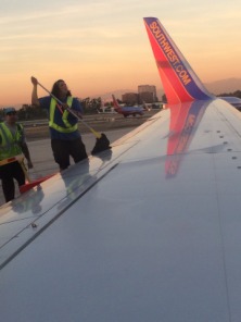 2015-11-18-Las-Vegas-06-fixing-frost-on-wing-with-gasoline.JPG