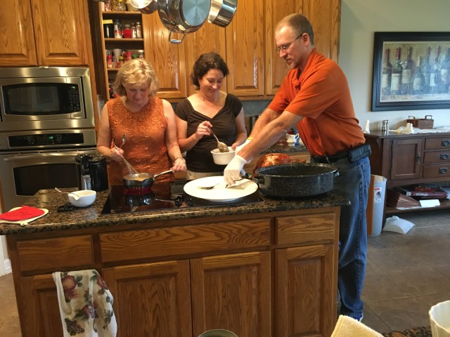 2015-11-26-Thanksgiving-Adriana-visit-11-turkey-carving-Suzi-Janeen-Travis.JPG