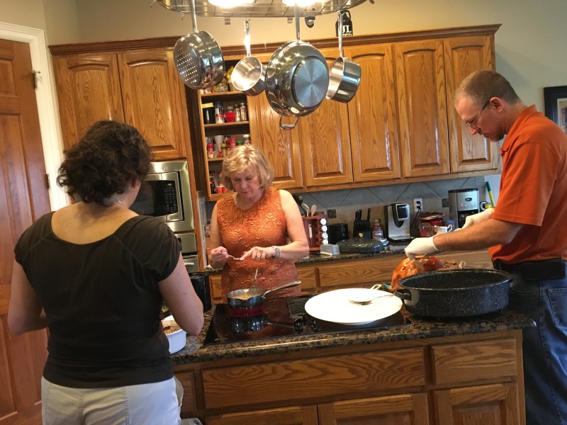2015-11-26-Thanksgiving-Adriana-visit-12-turkey-carving-Suzi-Janeen-Travis.JPG
