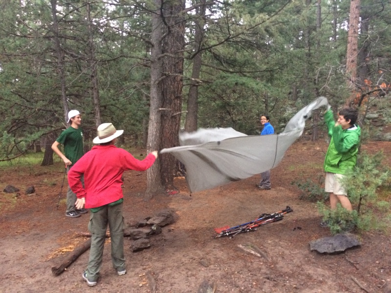 2015-07-02-Philmont-5star-001-Rimrock-shaking-tarp-Chance-Dax-Rhys-Will.jpg