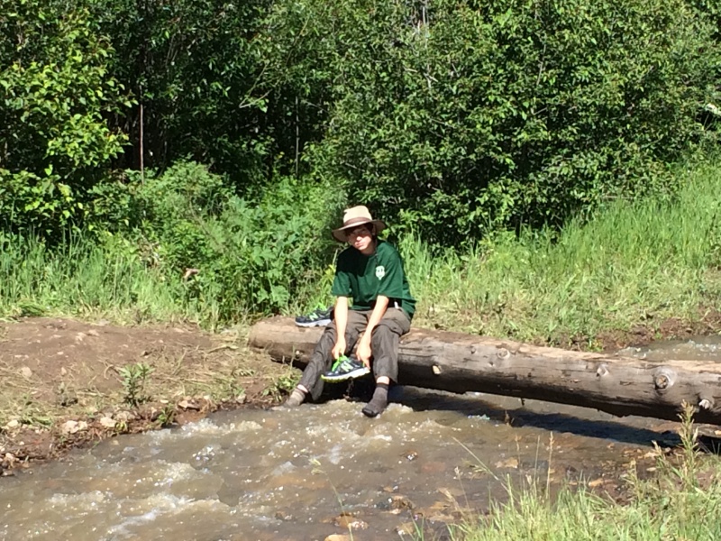 2015-07-09-Philmont-5star-007-wet-hike-to-Ponil-Dax-cleaning-shoes.jpg