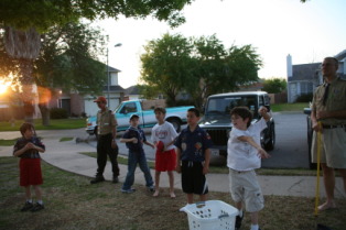 2009-04-01-Pack409-Den1-Physical-Fitness-41-9hole-golf-Logan-Andrew-Chance-CJ-Dax-Travis.JPG