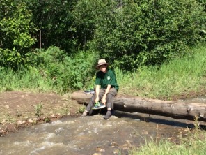 2015-07-09-Philmont-5star-007-wet-hike-to-Ponil-Dax-cleaning-shoes.jpg