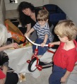 2002-12-25-Xmas-23-Dax-tricycle-Suzi-Chance-Grammy.JPG