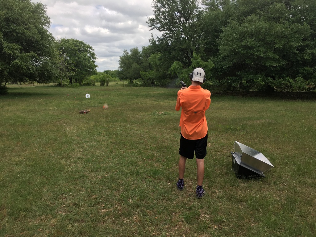 2017/04(April)/Camping-JohnMiller-land/1024x768_2017-04-08-John-Miller-Land-Camping-05-Chance-shooting-gun.JPG