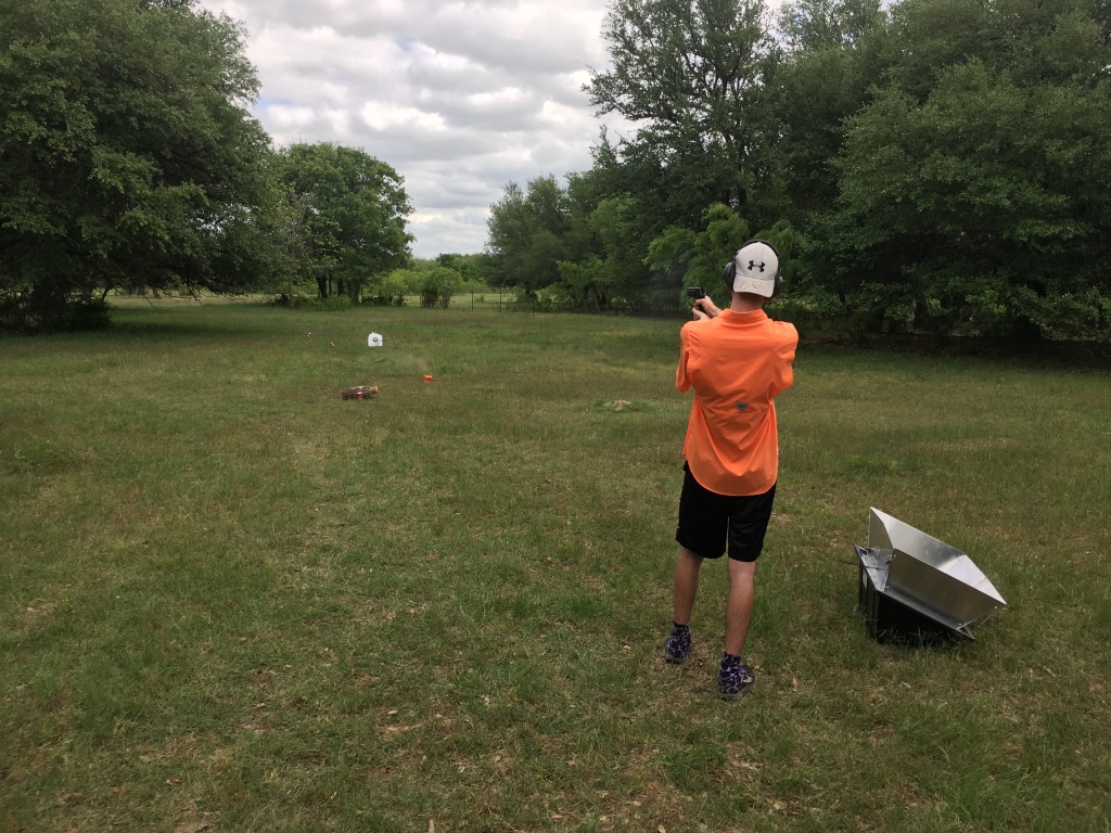 2017/04(April)/Camping-JohnMiller-land/1024x768_2017-04-08-John-Miller-Land-Camping-07-Chance-shooting-gun.JPG