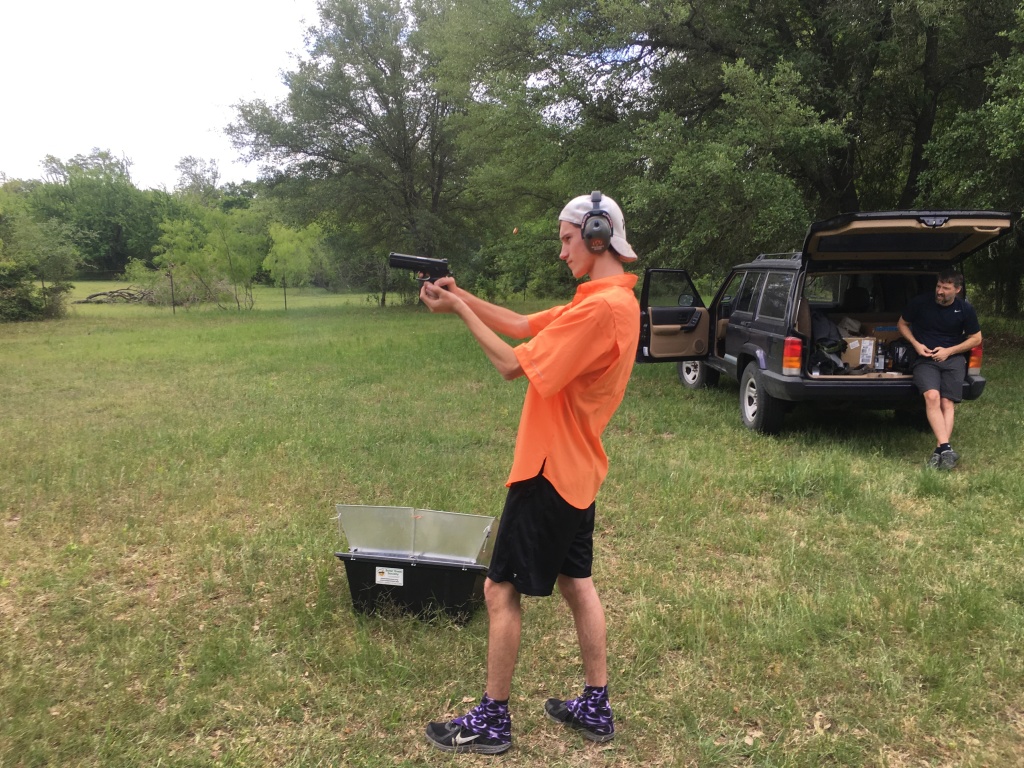 2017/04(April)/Camping-JohnMiller-land/1024x768_2017-04-08-John-Miller-Land-Camping-09-Chance-shooting-gun-Troy.JPG