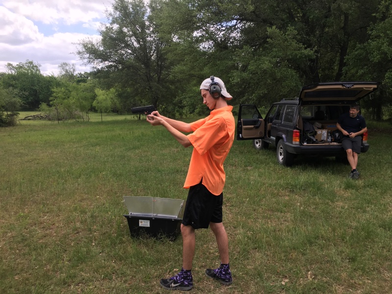2017-04-08-John-Miller-Land-Camping-08-Chance-shooting-gun-GOOD.JPG