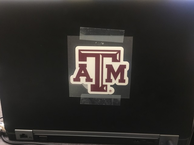 2018-05-15-Travis-Work-computer-with-TAMU-sticker.JPG