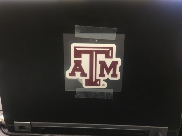 2018-05-15-Travis-Work-computer-with-TAMU-sticker.JPG