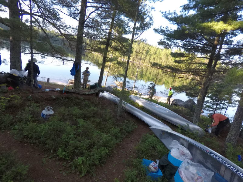 2018/06(June)/Northern-Tier-Crew-8787/800x600_2018-06-14-Northern-Tier-Crew8787-06-setting-up-camp-bear-canoe.JPG