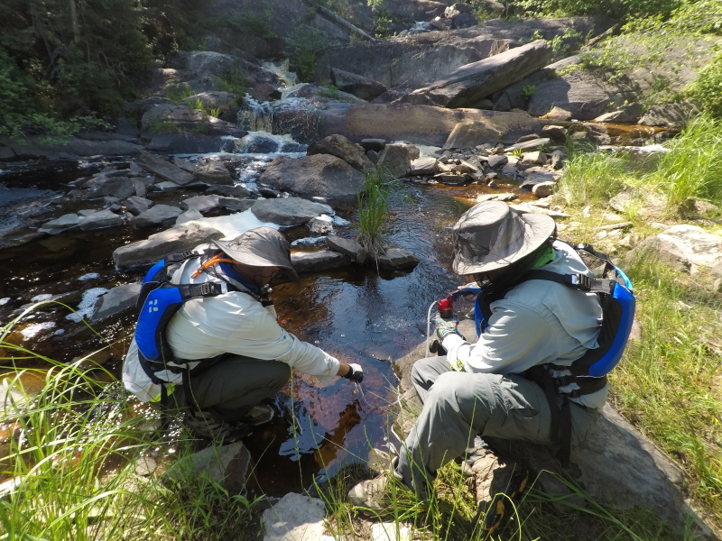 2018-06-20-Northern-Tier-Crew8787-07-Travis-Carl-filtering-water.JPG