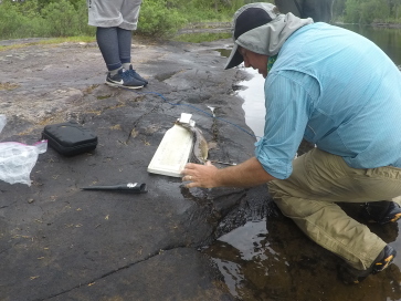 2018-06-16-Northern-Tier-Crew8787-11-Bob-cleaning-fish.JPG