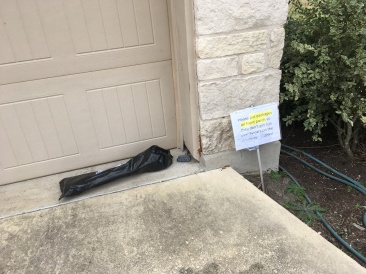 2019-01-22-way-to-not-leave-the-package-near-the-sign.JPG