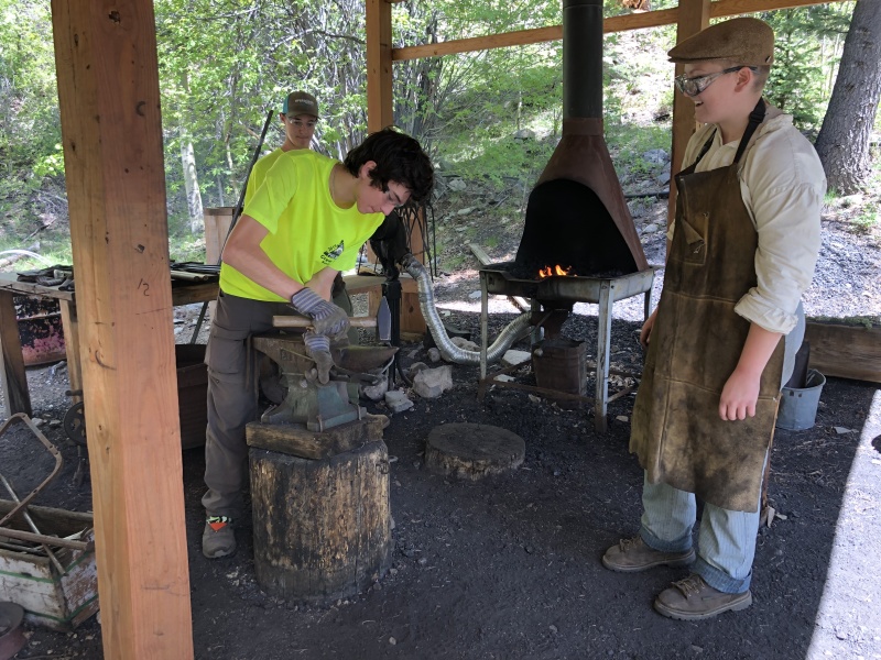 2019/06(June)/Philmont-Crew8787/800x600_2019-06-12-Philmont-Crew8787-12-Dax-Dominic-blacksmith-CopperPark.JPG