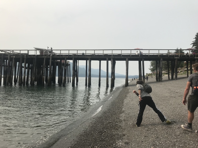 2019-07-08-50th-anniversary-cruise-Icy-Strait-Hoonah-34-Dax-Justin-skipping-rocks.JPG