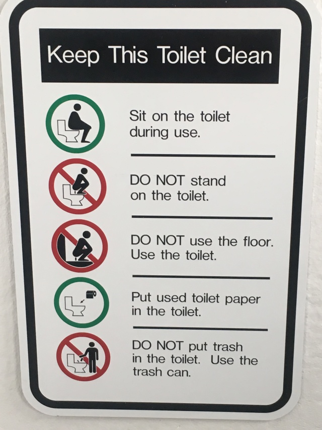 2019-07-13-50th-anniversary-cruise-Anchorage-15-funny-toilet-sign.JPG