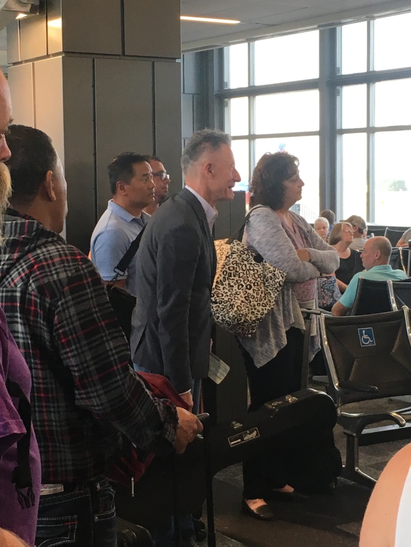 2019-09-09-LyleLovett-in-Austin-airport-riding-with-Travis.JPG