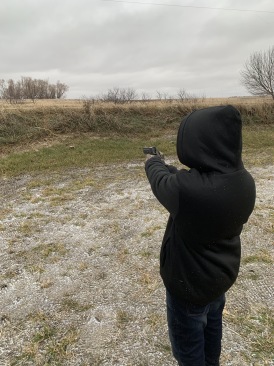 2019-11-10-SD-Pheasant-Hunting-06-Jake-9mm-pistol.JPG