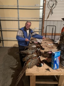2019-11-13-Pheasant-Hunting-07-Jim-cleaning-birds.JPG