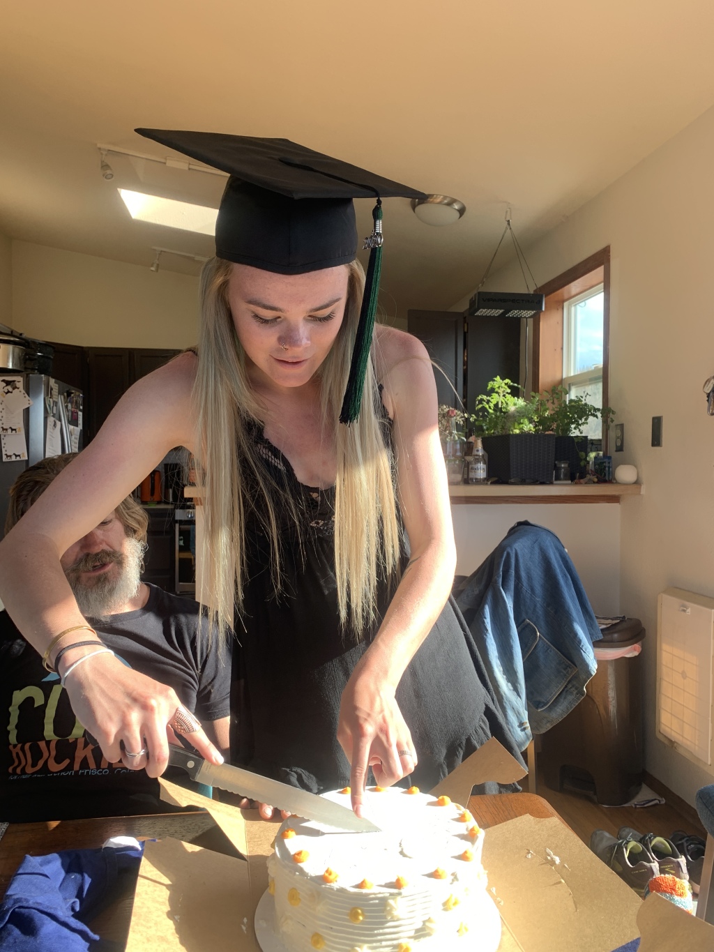2020/05(May)/Colorado/1024x768_2020-05-09-Colorado-09-Kyla-cutting-cake.JPG