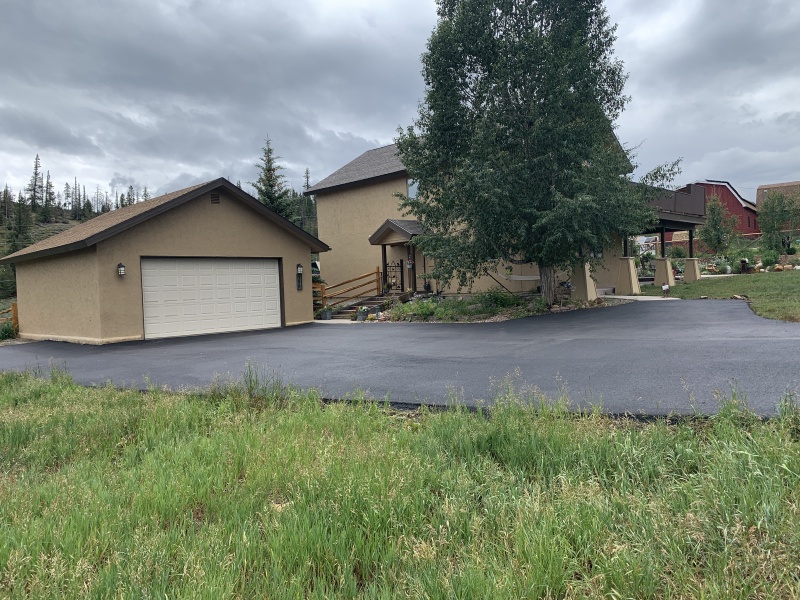 2020-07-27-Breckenridge-House-Inspection-56-garage-and-house-new-driveway.JPG