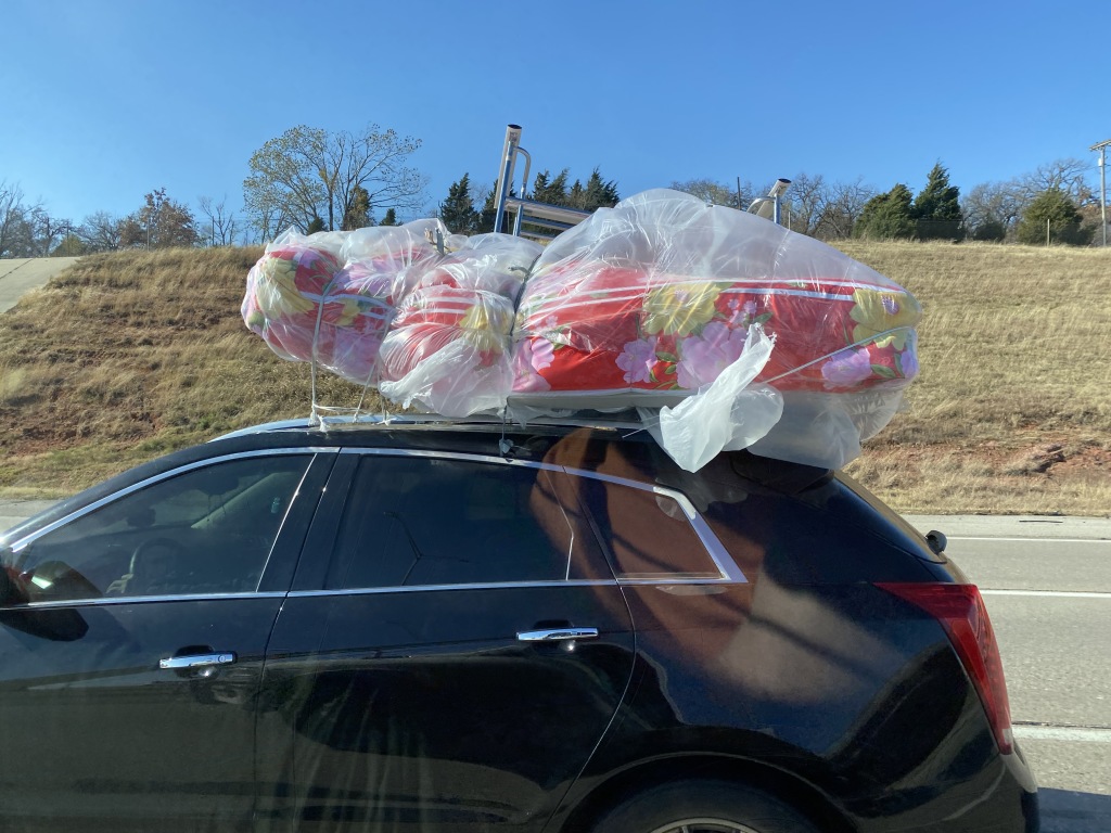 2020/11(November)/Hunting-South-Dakota/1024x768_2020-11-14-SD-Hunting-08-Idiot-in-car-with-mattress.JPG