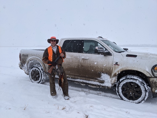 2020/11(November)/Hunting-South-Dakota/640x480_2020-11-10-SD-Hunting-08-snow-Travis-bird-truck.JPG