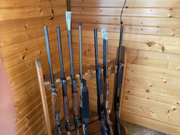 2020-11-13-SD-Hunting-01-guns-with-dollars.JPG