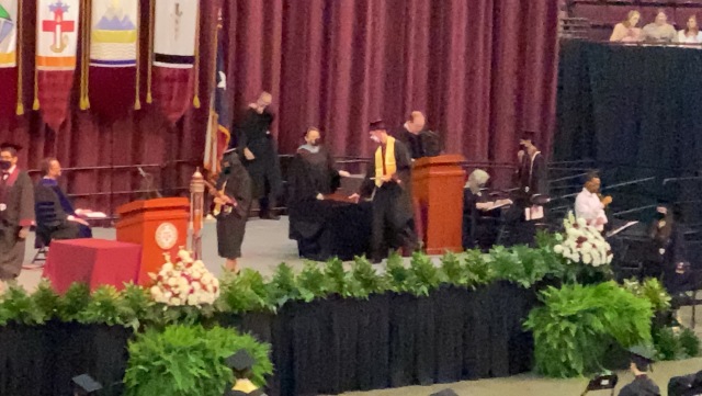 2021-05-15-TAMU-Chemistry-Graduation-Chance-06-walking-the-stage-Doug.JPG