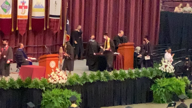 2021-05-15-TAMU-Chemistry-Graduation-Chance-07-walking-the-stage-Doug.JPG
