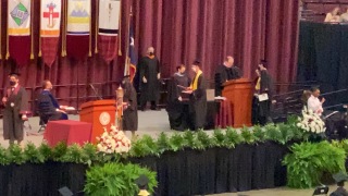 2021-05-15-TAMU-Chemistry-Graduation-Chance-08-walking-the-stage-Doug.JPG