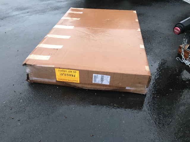 2021/06(June)/Breckenridge-Move/2021-05-17-TV-delivered-early-in-the-rain.JPG