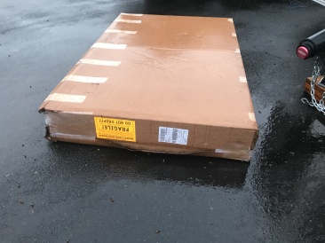 2021-05-17-TV-delivered-early-in-the-rain.JPG