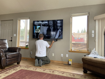 2021-06-01-Move-2-Travis-mounting-TV-GOOD.jpg