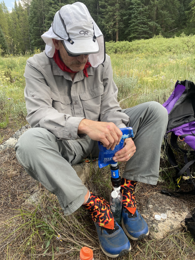 2021-07-26-Colorado-Trail-50-Segment8-Carl-filtering-water.jpg